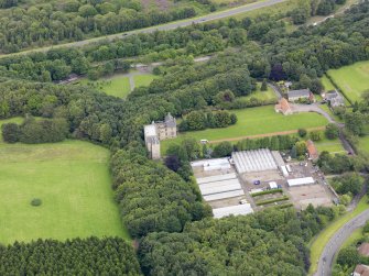 Oblique aerial view of Kinneil House and Duchess Anne Cottages, Bo'ness, taken from the SSE.