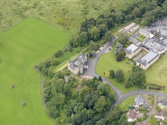 Oblique aerial view of Airth Castle and Old Parish Church, taken from the NE.