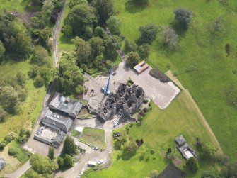 Oblique aerial view of Argaty House and stables, taken from the WNW.