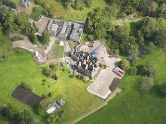 Oblique aerial view of Argaty House and stables, taken from the SW.