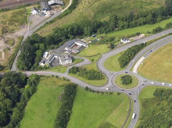 Oblique aerial view of Old Brig Inn, taken from the ENE.