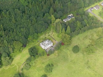 Oblique aerial view of Craigielands House and stables, taken from the ESE.