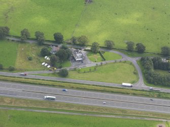 Oblique aerial view of Dinwoodie Lodge Hotel, taken from the WSW.