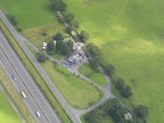 Oblique aerial view of Dinwoodie Lodge Hotel, taken from the SSW.