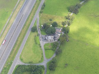 Oblique aerial view of Dinwoodie Lodge Hotel, taken from the SE.