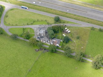 Oblique aerial view of Dinwoodie Lodge Hotel, taken from the NE.