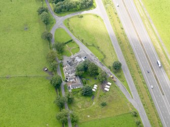 Oblique aerial view of Dinwoodie Lodge Hotel, taken from the N.