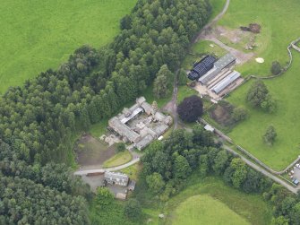 Oblique aerial view of Jardine Hall stables, taken from the NNE.