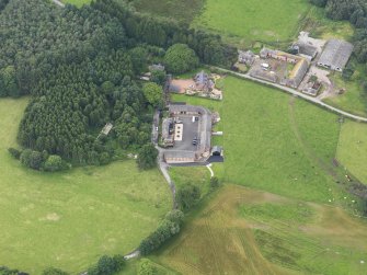 Oblique aerial view of Halleaths Stables, taken from the NE.