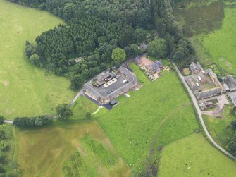 Oblique aerial view of Halleaths Stables, taken from the NNE.