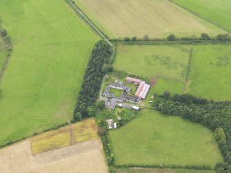 Oblique aerial view of Shortrigg Farmhouse, taken from the NE.