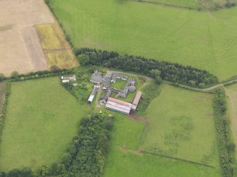 Oblique aerial view of Shortrigg Farmhouse, taken from the NNW.