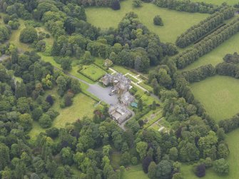 Oblique aerial view of Castlemilk country house, taken from the NE.