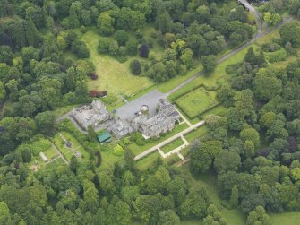 Oblique aerial view of Castlemilk country house, taken from the WNW.
