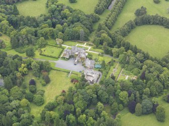 Oblique aerial view of Castlemilk country house, taken from the ENE.