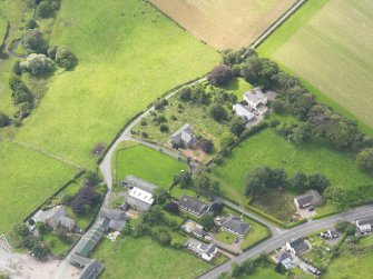 Oblique aerial view of Dornock Parish Church, taken from the NNE.