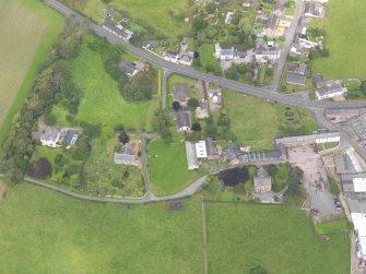 Oblique aerial view of Dornock Parish Church, taken from the SSE.