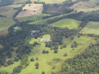 General oblique aerial view of Springkell House and policies, taken from the S.