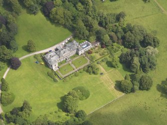 Oblique aerial view of Springkell House, taken from the SW.