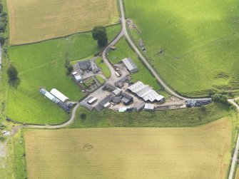 Oblique aerial view of Milnholm Farmhouse, taken from the NNE.