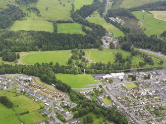 General oblique aerial view of Langholm Race Course, taken from the SW.