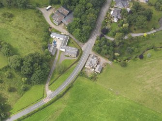Oblique aerial view of Priorslynn Cottage, taken from the E.