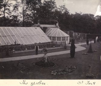 General view of the conservatory and greenhouse at St Fort House.
