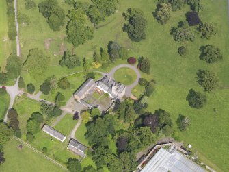 Oblique aerial view of Kirkconnel House and stables, taken from the SW.