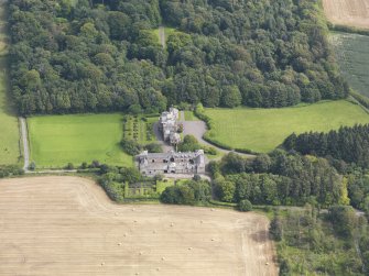 Oblique aerial view of Arbigland House and stables, taken from the NW.
