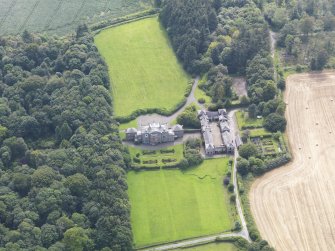 Oblique aerial view of Arbigland House and stables, taken from the NE.