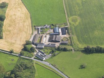 Oblique aerial view of Southwick House Home Farm, taken from the NW.