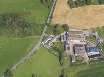 Oblique aerial view of Southwick House Home Farm, taken from the SW.