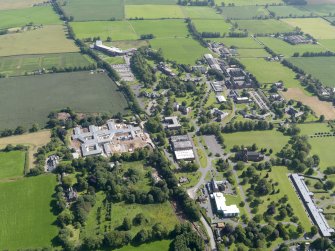 General oblique aerial view of Crichton Royal Hospital, taken from the NNW.