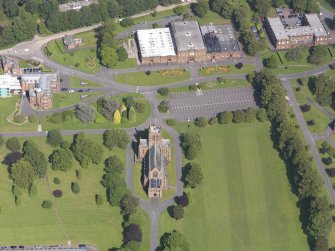 Oblique aerial view of Crichton Royal Hospital, centred on Crichton Memorial Church, taken from the WSW.