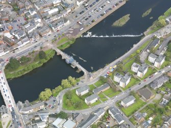 Oblique aerial view of Dumfries, centred on Old Bridge, taken from the W.