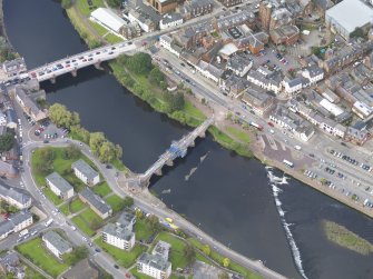 Oblique aerial view of Dumfries, centred on Old Bridge, taken from the S.