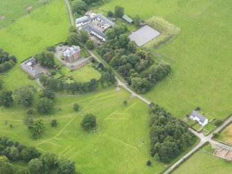 General oblique aerial view of Tinwald House and policies, taken from the ESE.