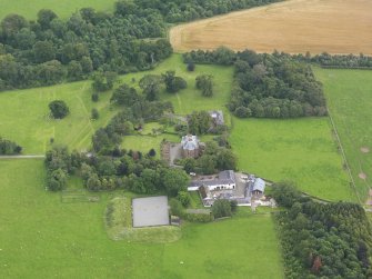 Oblique aerial view of Tinwald House and policies, taken from the NW.