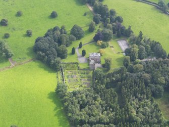Oblique aerial view of Amisfield House and policies, taken from the NNW.