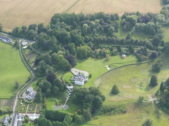 Oblique aerial view of Portrack House and gardens, taken from the NNE.