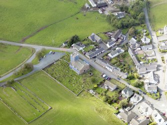 Oblique aerial view of Dunscore Parish Church, taken from the SE.