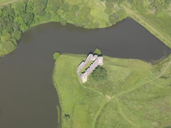 Oblique aerial view of Morton Castle, taken from the SW.
