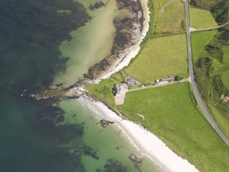 Oblique aerial view of Killean and Kilchenzie Parish Church, taken from the SW.