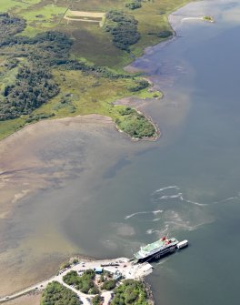 General oblique aerial view of Kennacraig pier and dun at Eilean Araich Mhoir, taken from the NE.