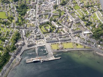 General oblique aerial view of Rothesay, centred on the castle, taken from the NNE.