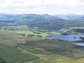 General oblique aerial view looking over the the Lake of Menteith towards the Menteith Hills, taken from the SE.