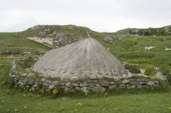 View of reconstructed Iron Age site at Bosta, taken from SSW