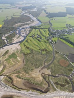 General oblique aerial view of Garmouth and Kingston Golf Course looking up the River Spey, taken from the NNW.