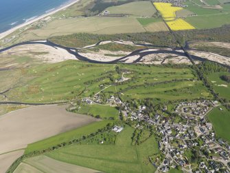 General oblique aerial view of Garmouth and Kingston Golf Course with the River Spey adjacent, taken from the WNW.