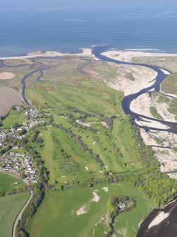 General oblique aerial view of Garmouth and Kingston Golf Course with the River Spey adjacent, taken from the S.